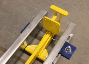 Pallet Hold Back Device For Flow Lanes